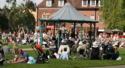 Crowd of people and bandstand