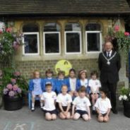 School children, Mayor, school, hanging baskets.