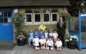 School children, Mayor, school, hanging baskets.