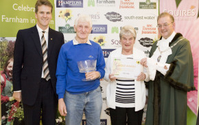 Male and female receive award from Mayor