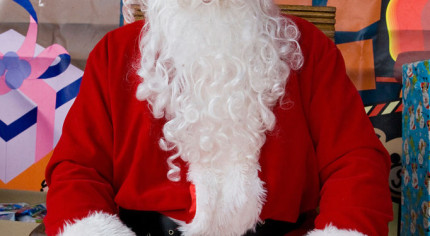 Male dressed as Father Christmas