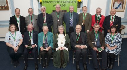 Group of people with Mayor front centre.